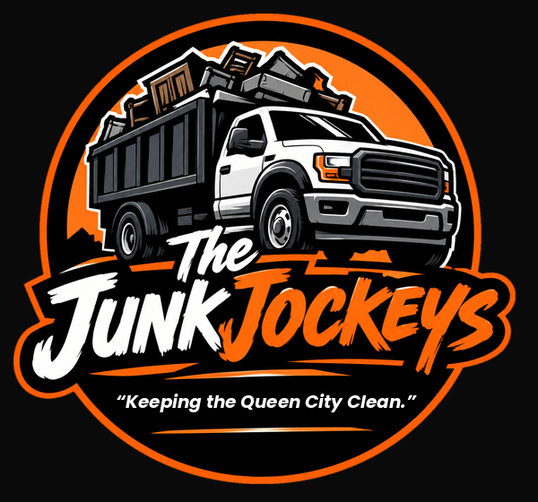 The Junk Jockeys logo: a dump truck loaded with furniture. Keeping the Queen City Clean.